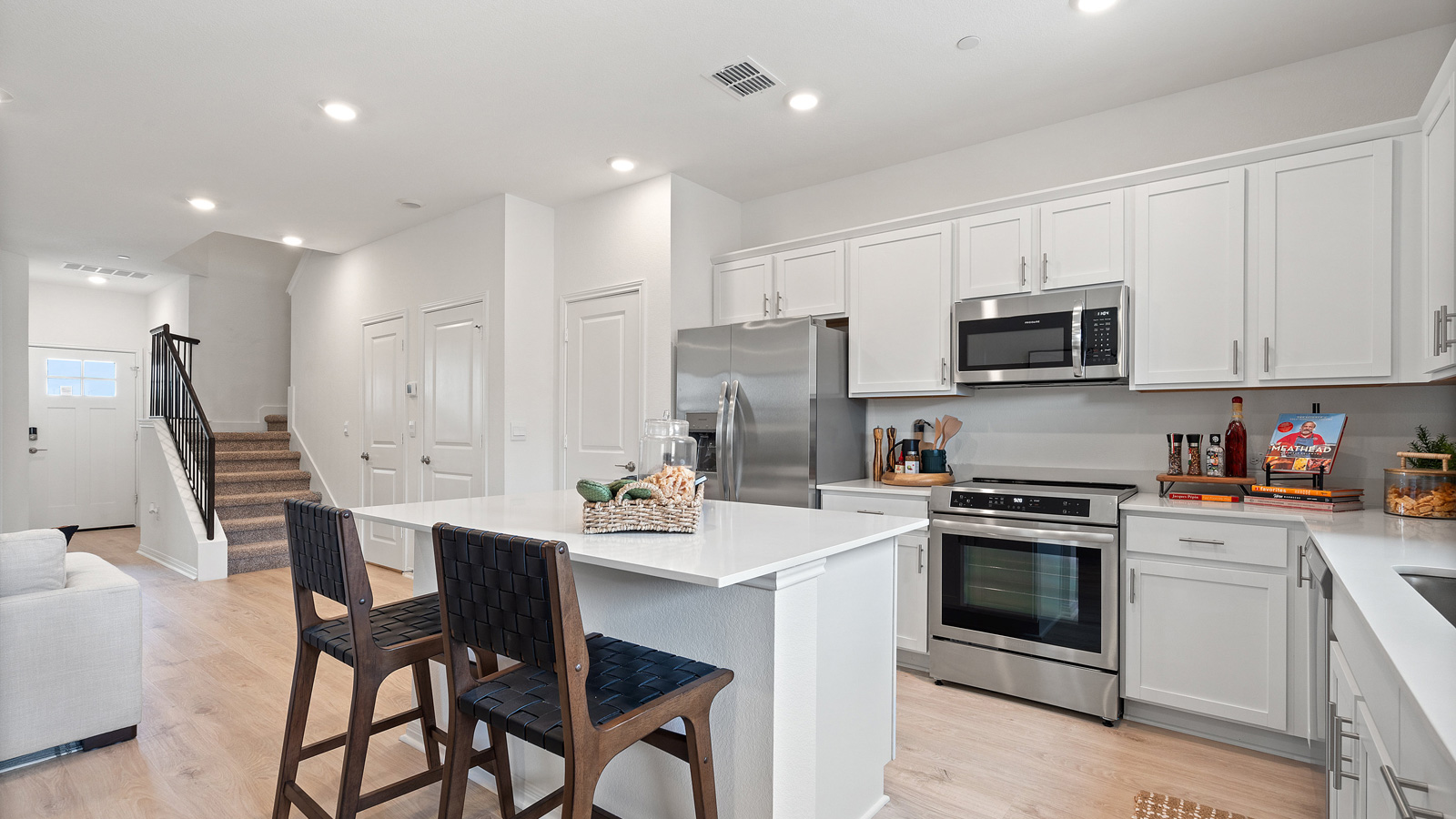 Kitchen with stainless steel appliances.