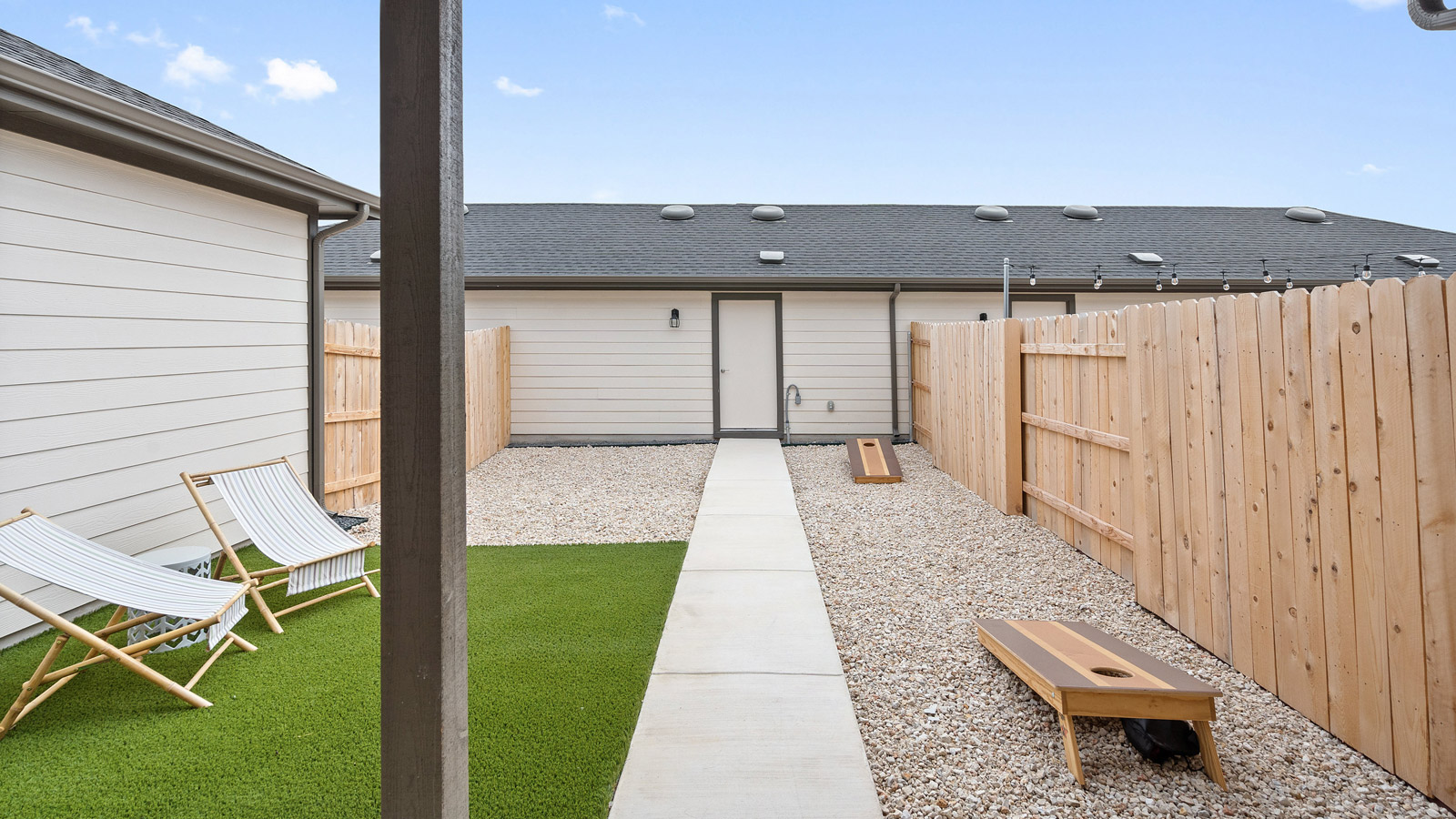 Low maintenance backyard with astroturf.