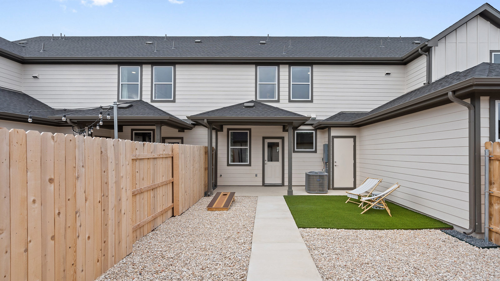 Low maintenance backyard with astroturf.