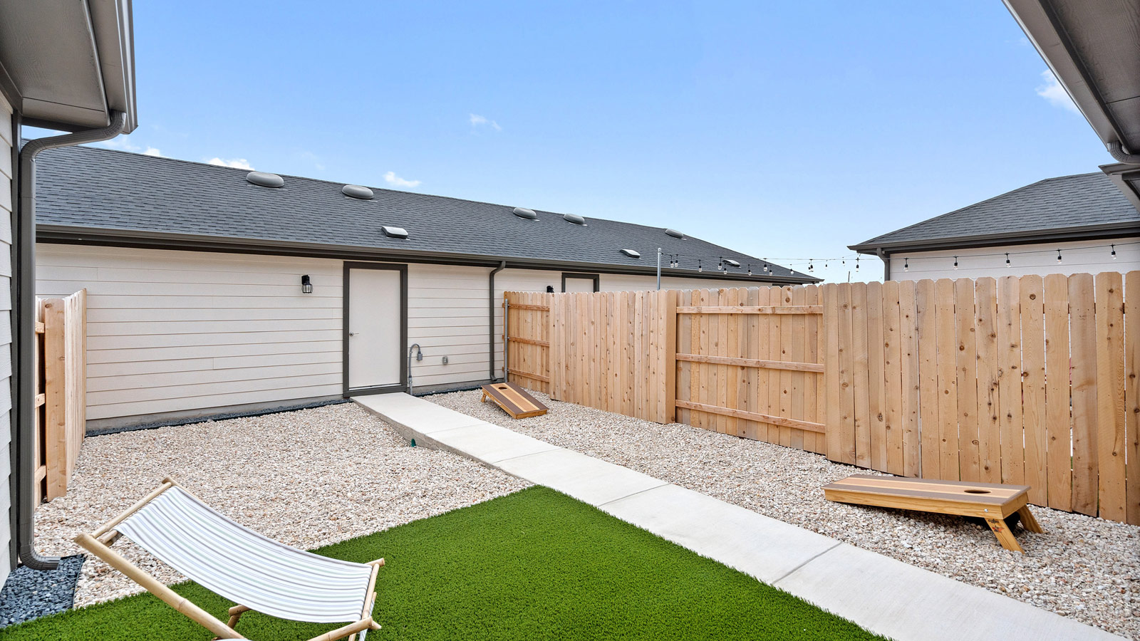 Low maintenance backyard with astroturf.