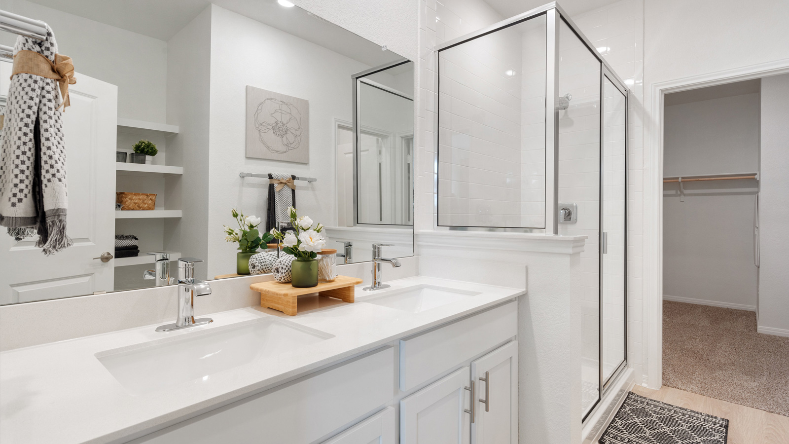 Primary bathroom with double vanity.