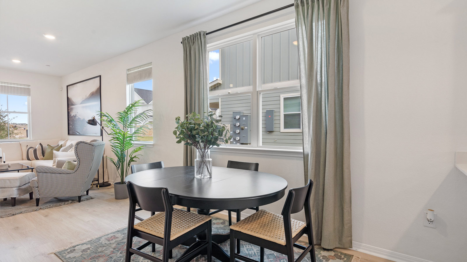 Dining space with large window.
