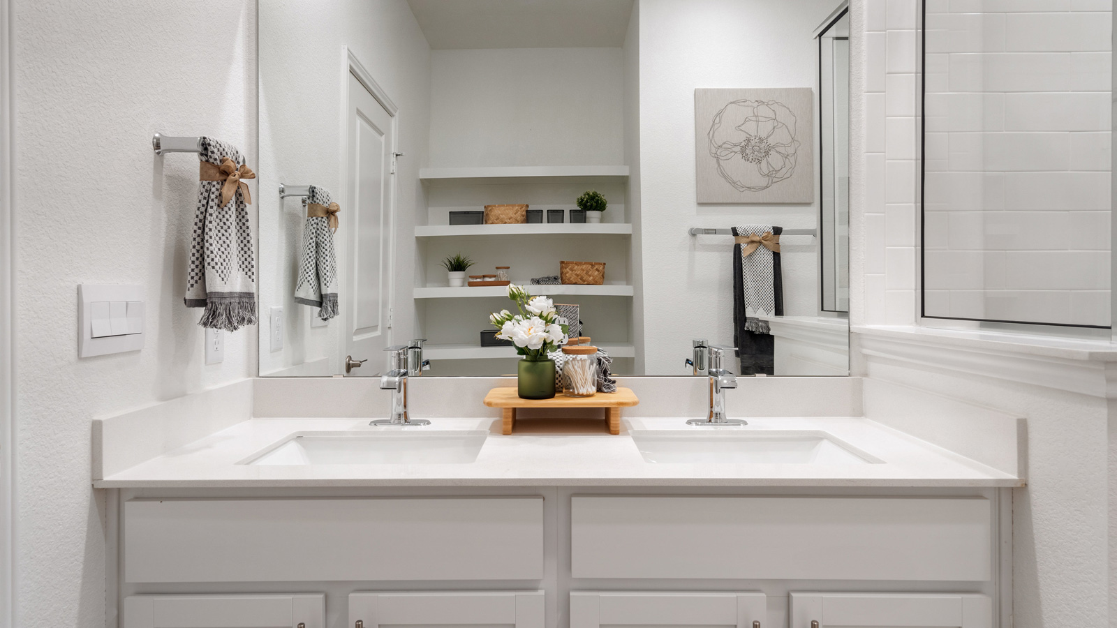 Primary bathroom with double vanity sink.