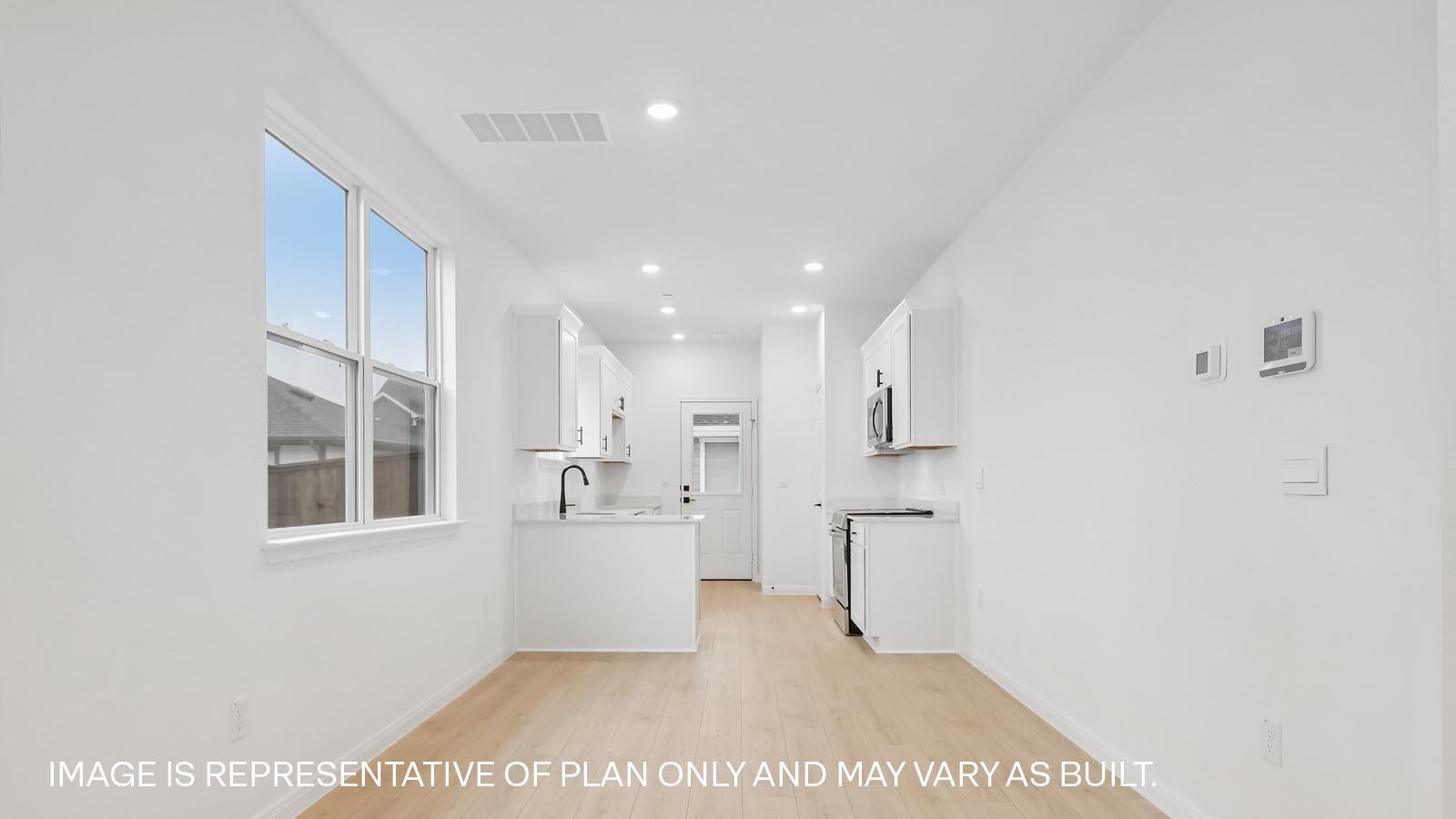Open concept living area and dining.