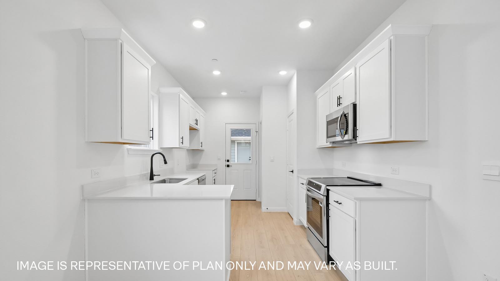 Beautiful kitchen with quartz countertops.