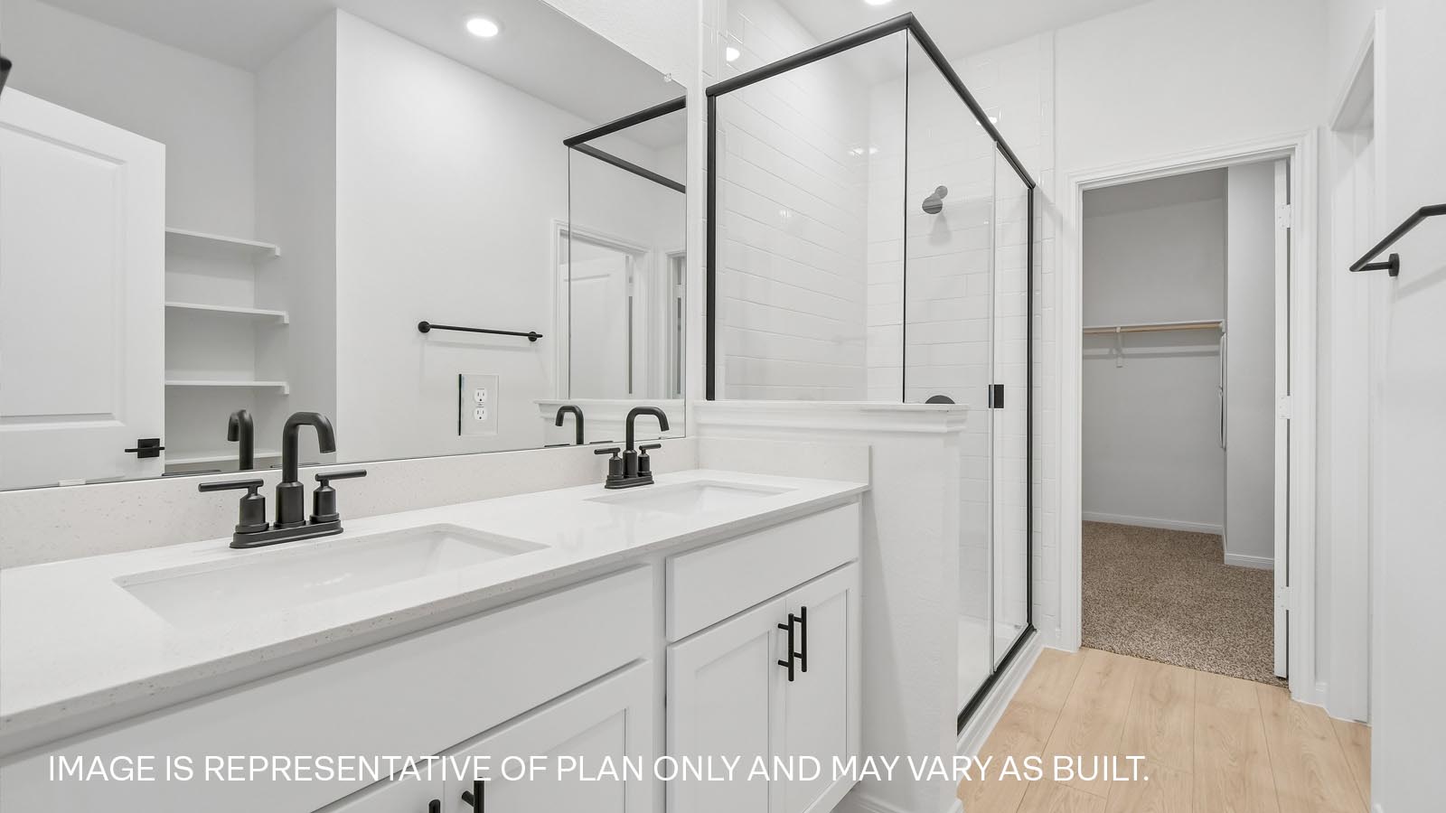 Main bathroom with quartz vanity and walk-in shower.