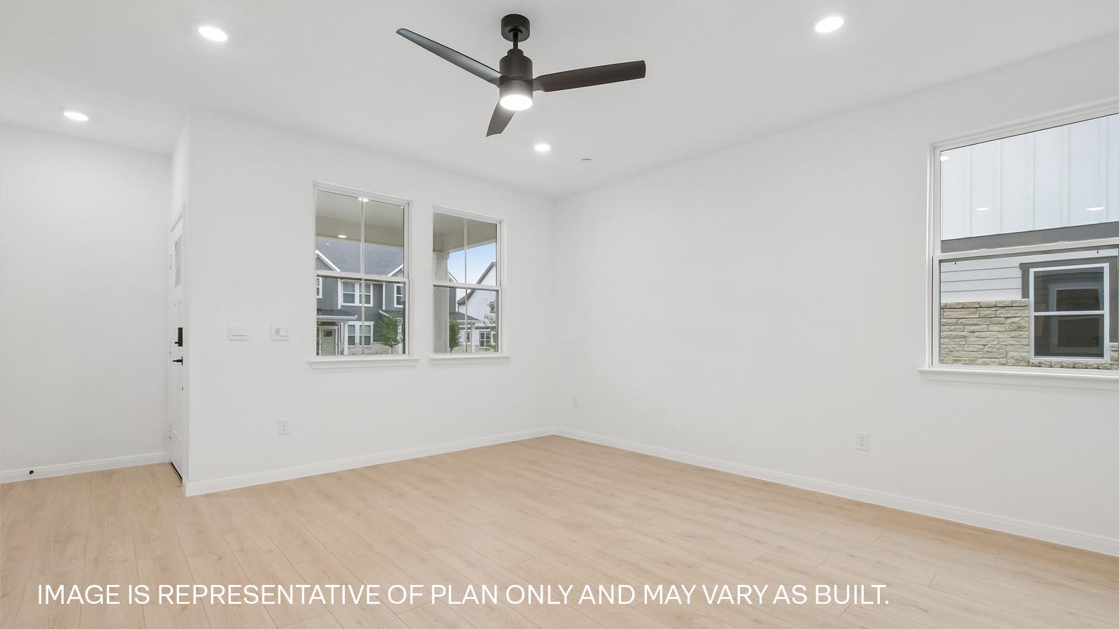 Living area with ceiling fan.
