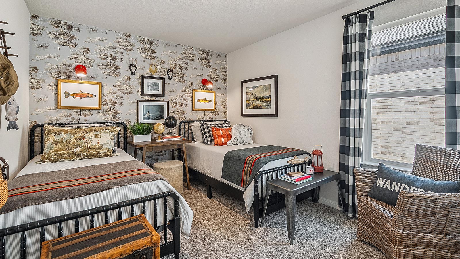 Bedroom with an accent wall and natural lighting.