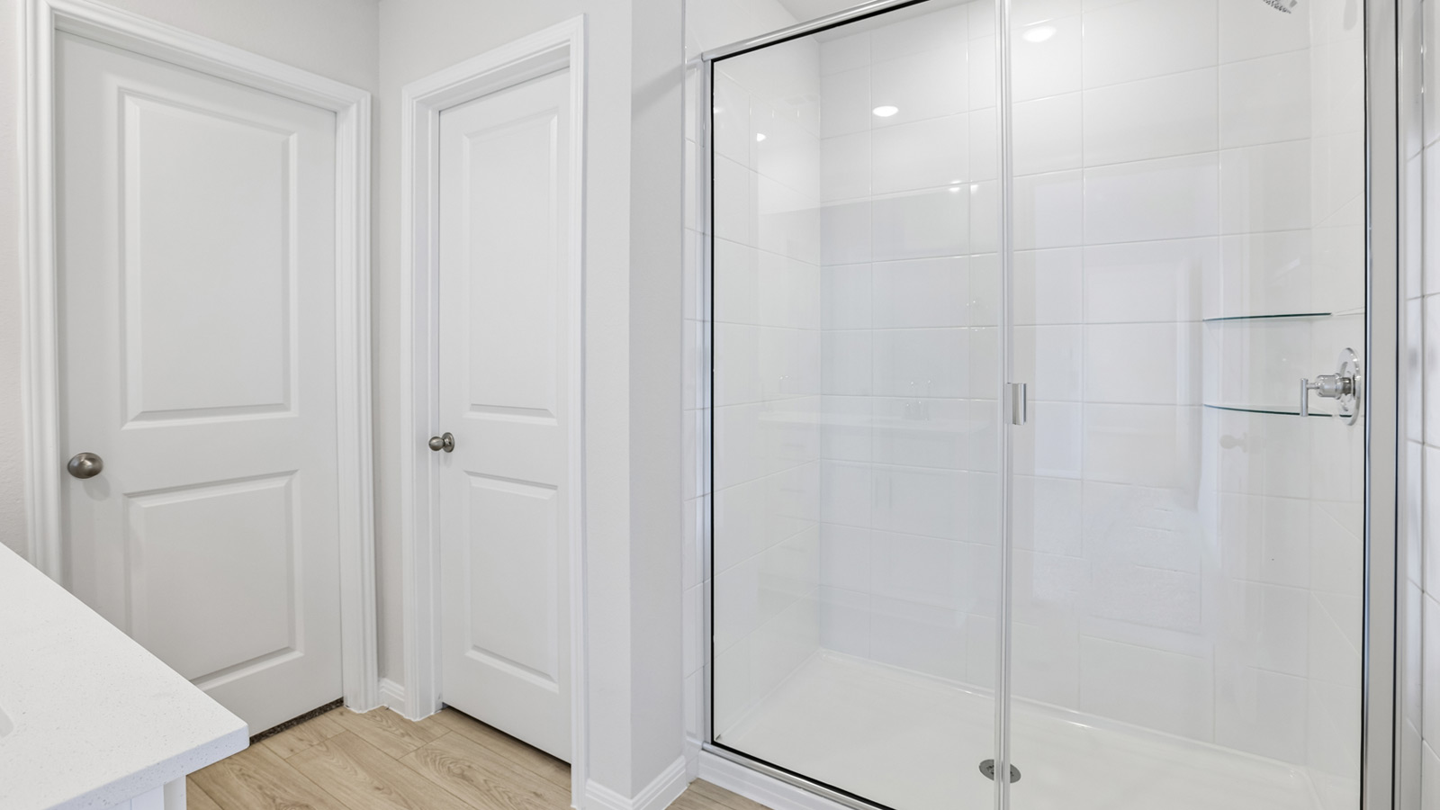 Walk-in shower in primary bathroom.