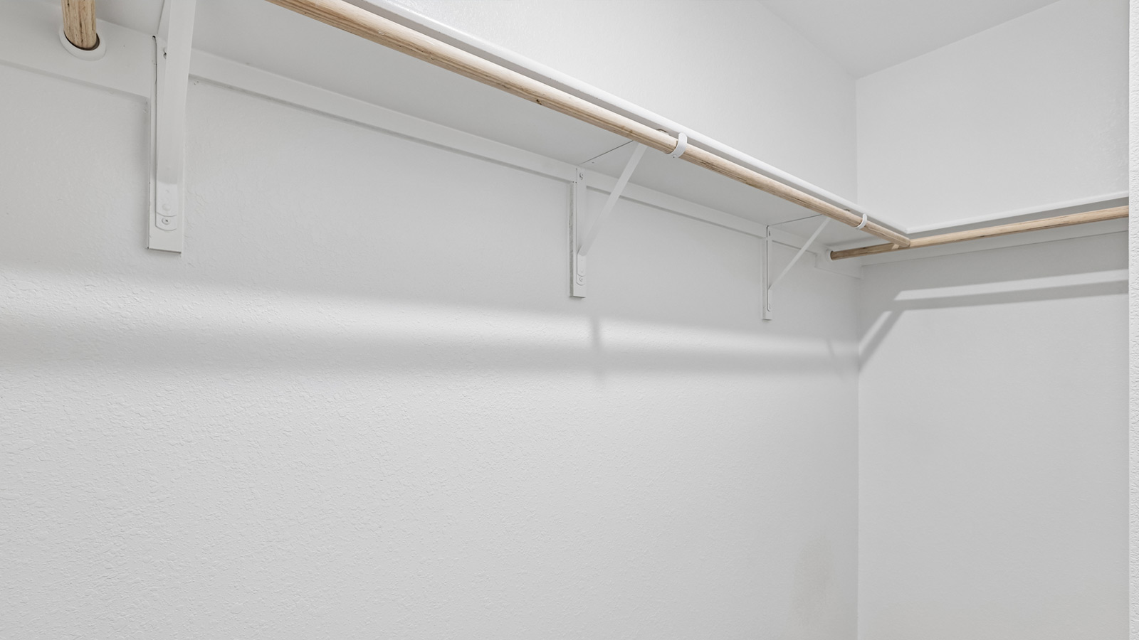 Closet in primary bathroom.