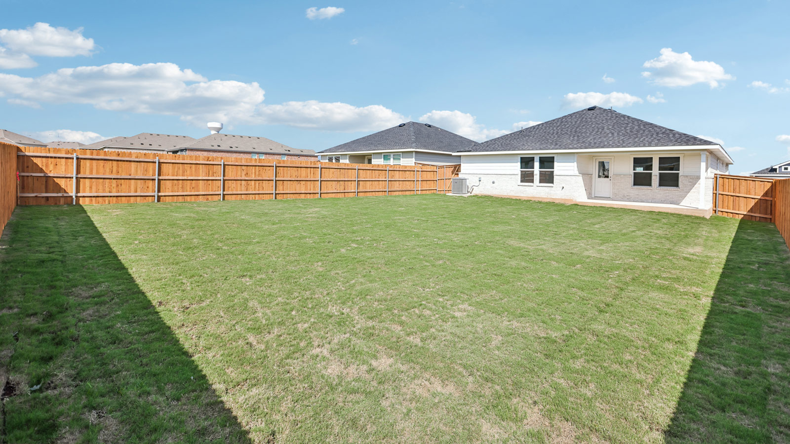 Large backyard of 125 Southridge Trail in Marble Falls, TX.