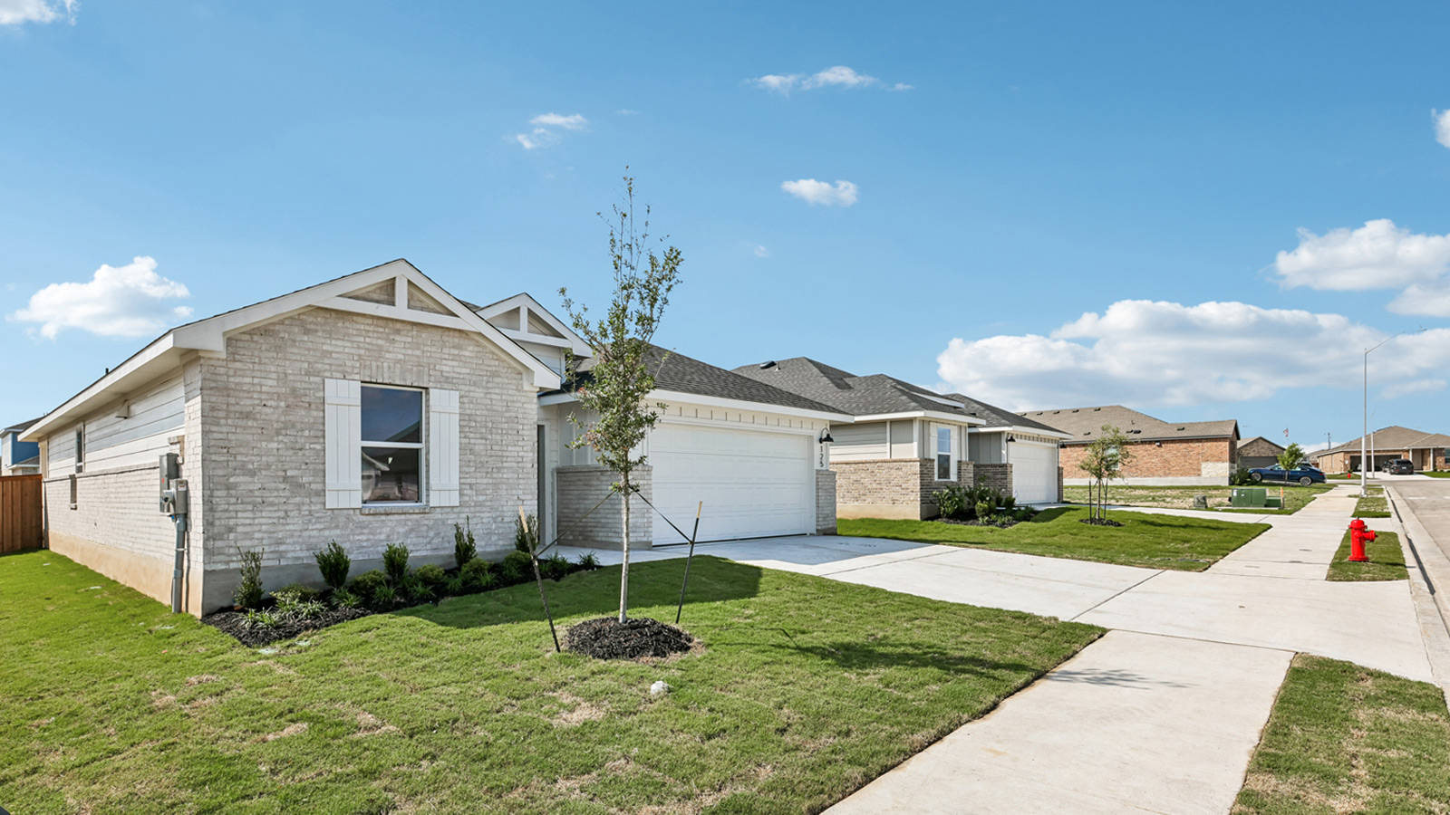Side exterior shot of 125 Southridge Trail at Thunder Rock in Marble Falls, TX.
