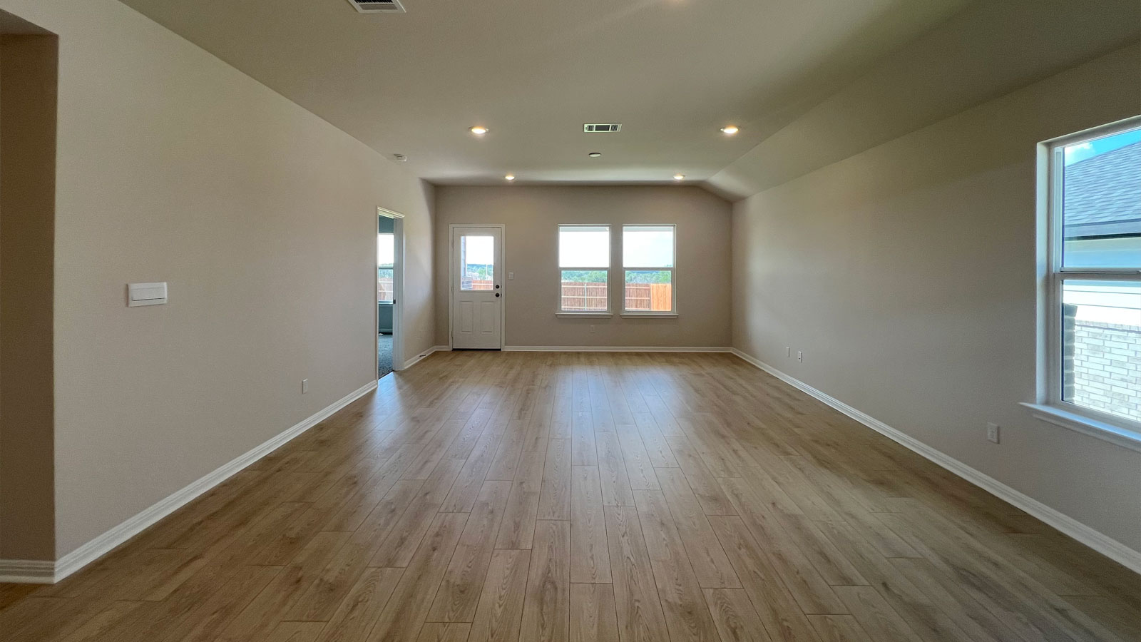 Open livingroom with large windows.