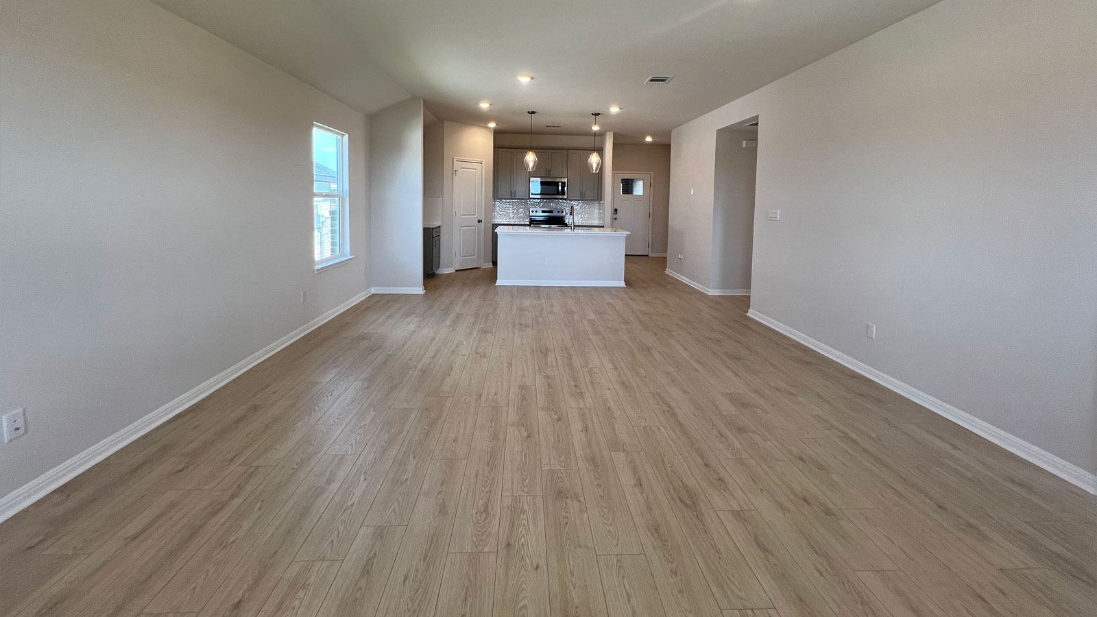Open livingroom with large windows.