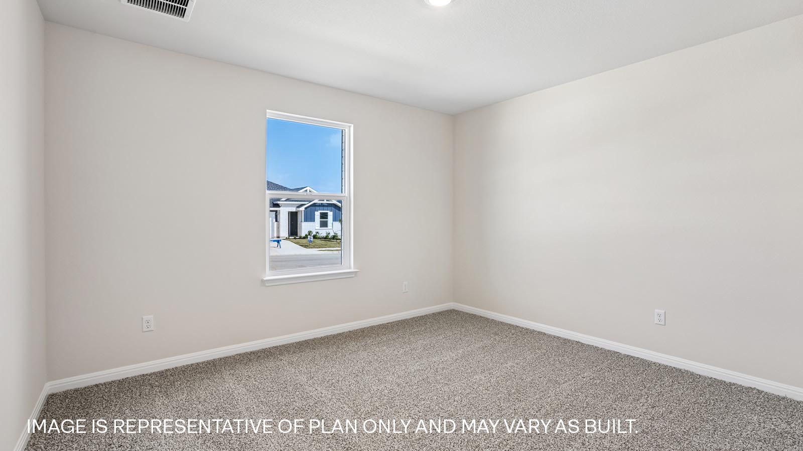 Bedroom 2 with carpeted flooring, window, and storage closet.