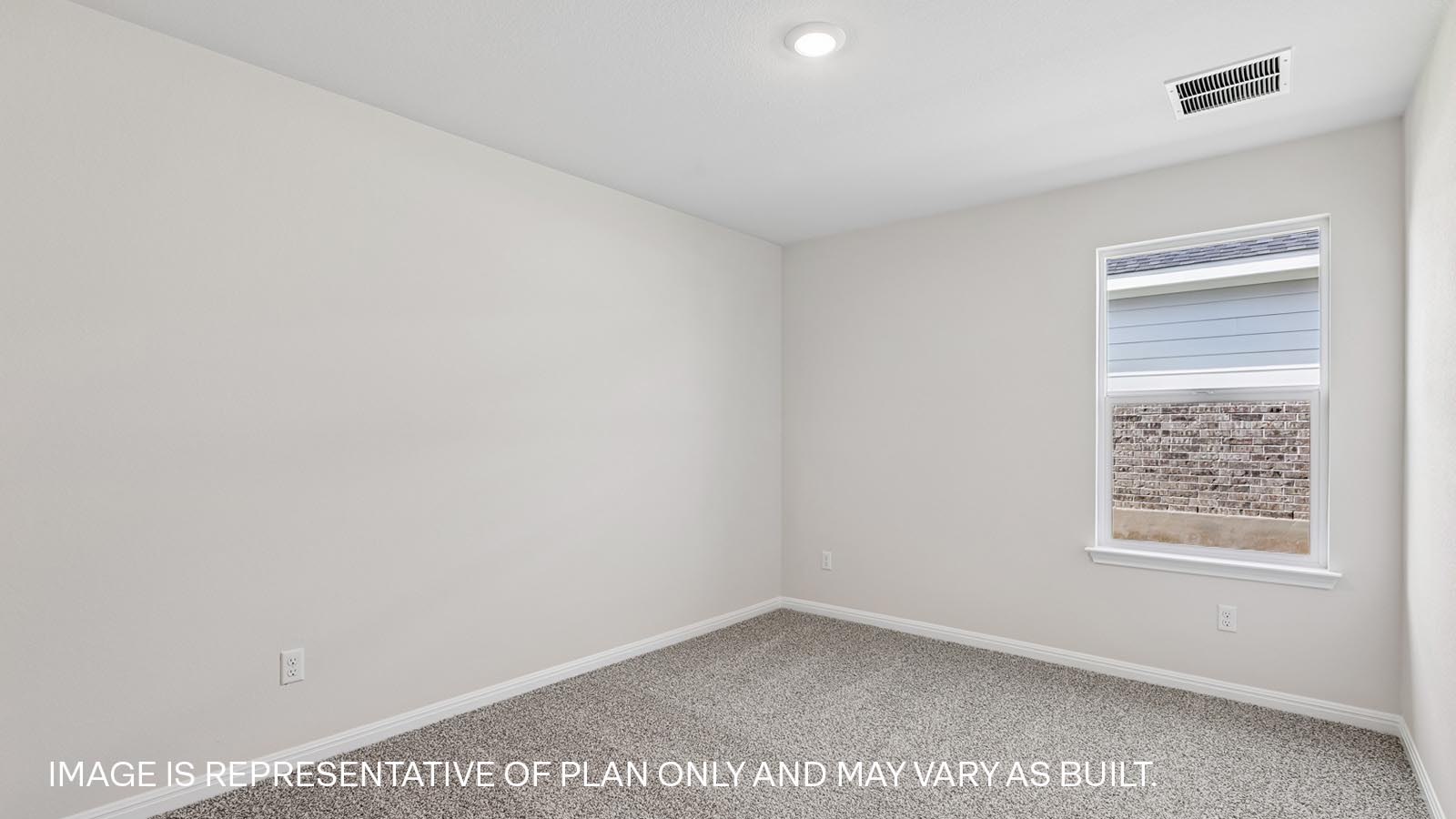 Bedroom 3 with carpeted flooring, window, and storage closet.