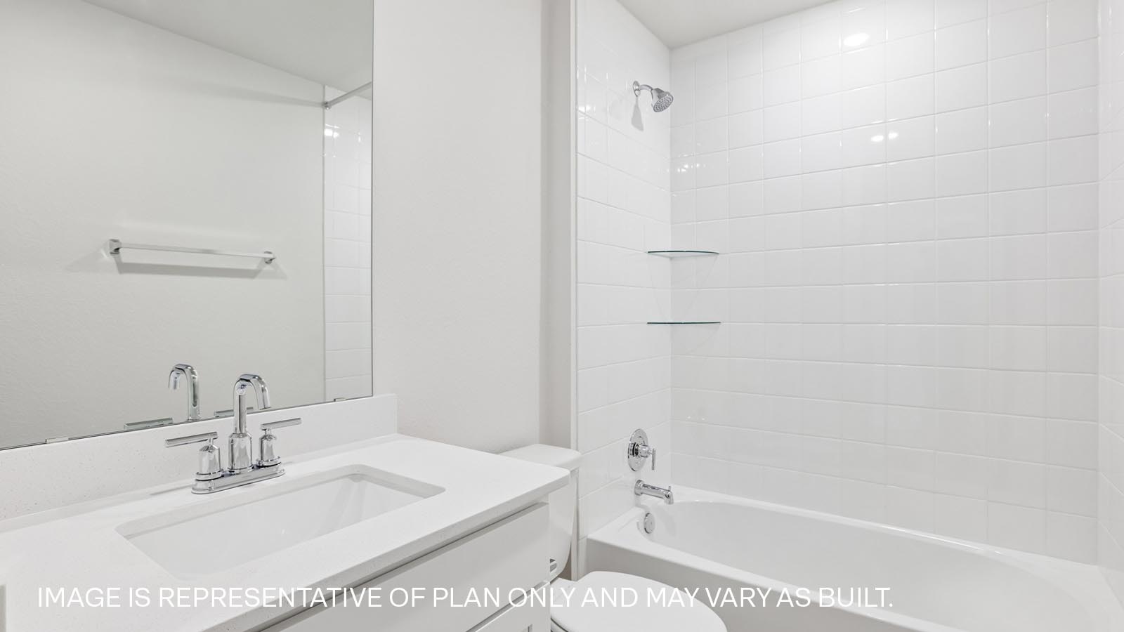 Secondary bathroom with quartz vanity, bathtub, and raised shower head.
