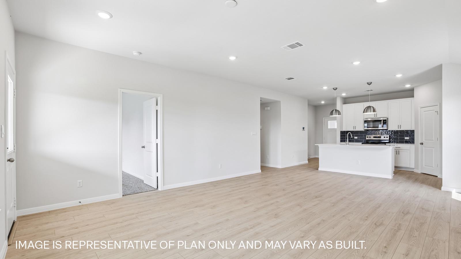 Living area with premium laminate wood plank flooring.