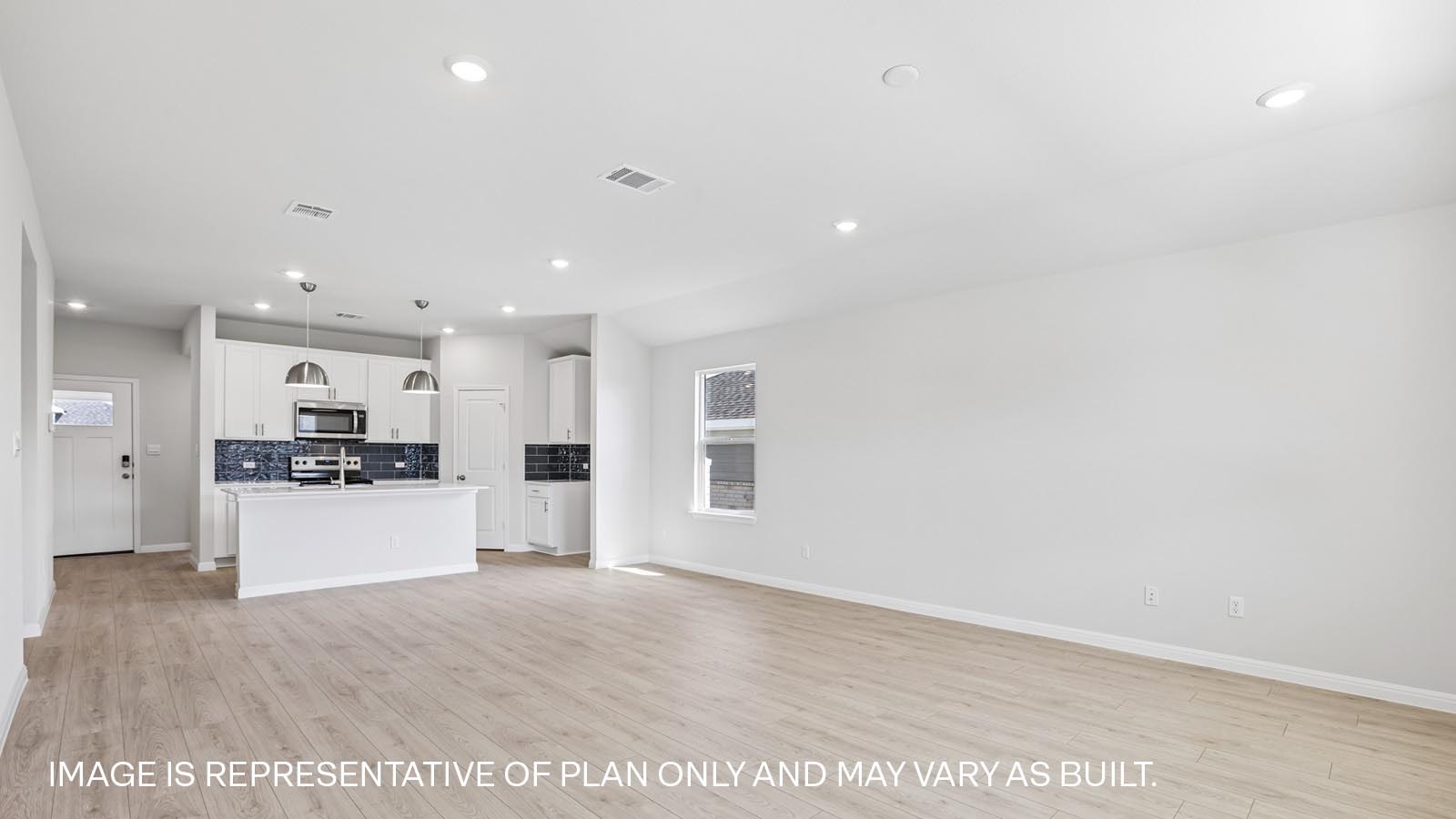 Living area with premium laminate wood plank flooring.