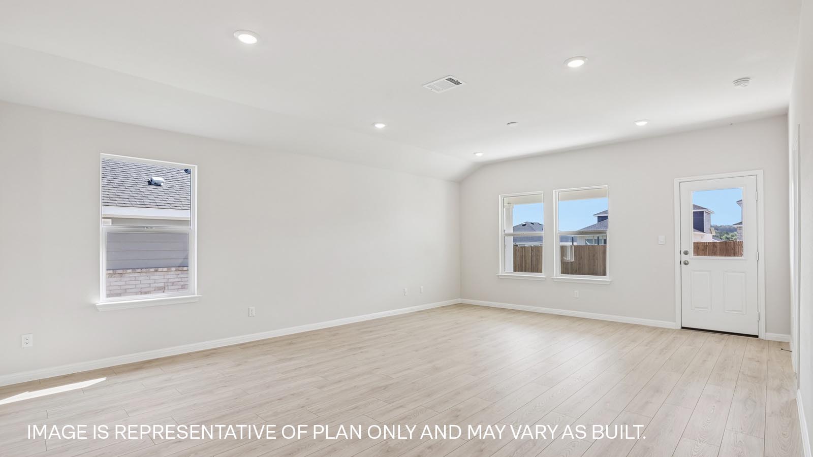 Living area with premium laminate wood plank flooring.