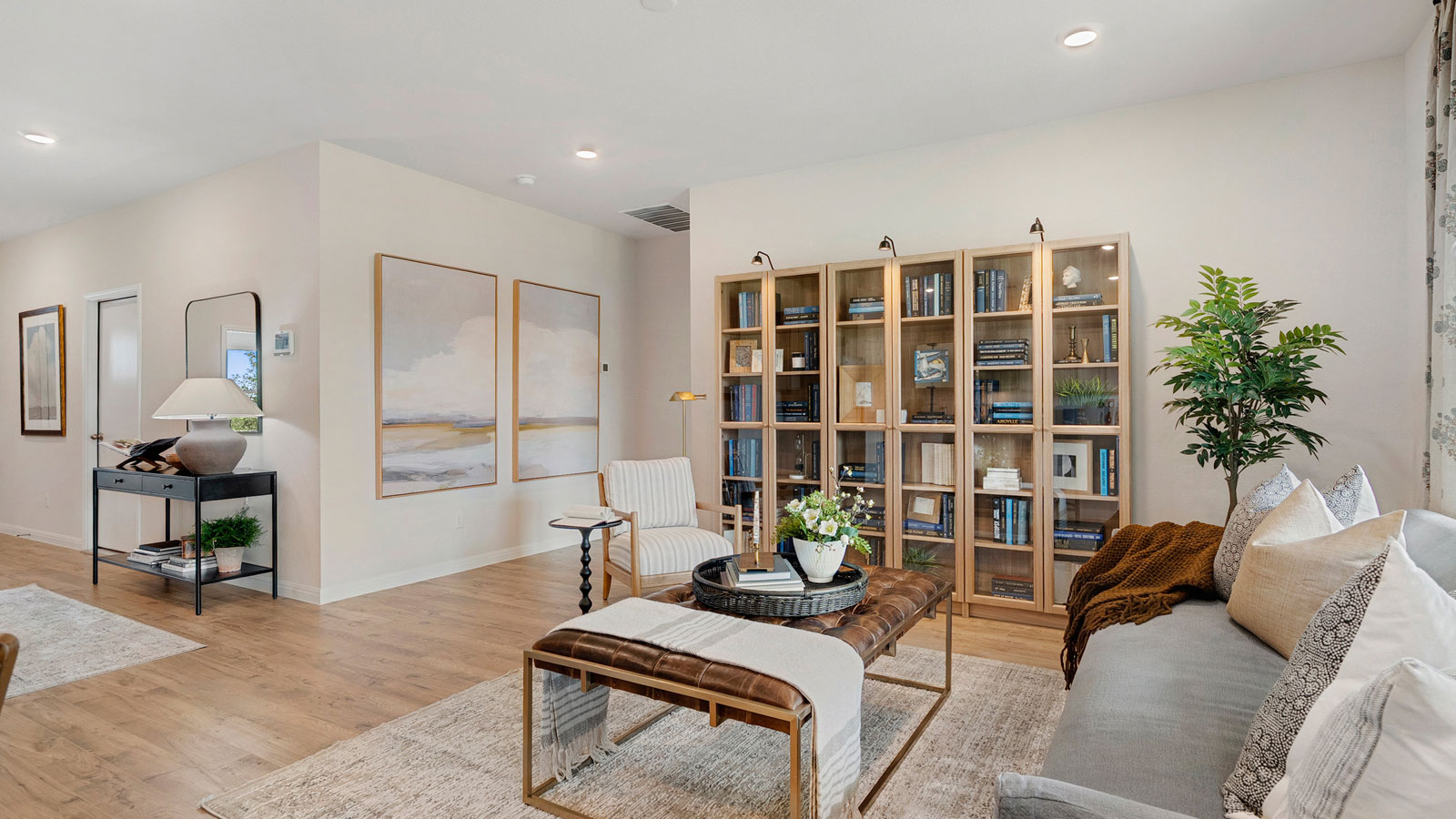 Main living area with clean flooring and natural light.