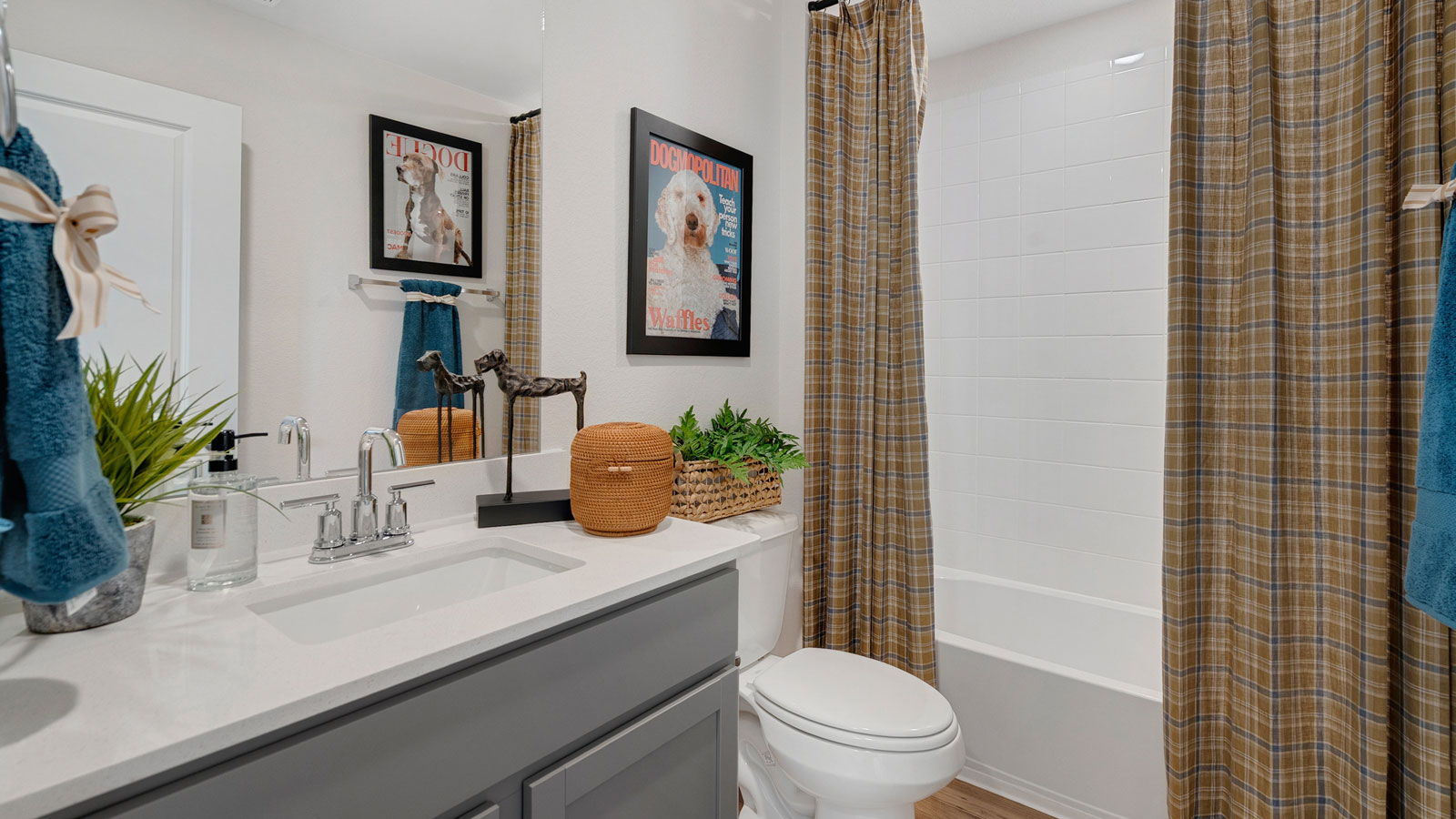 Bathroom featuring a sink, toilet, and shower tub.