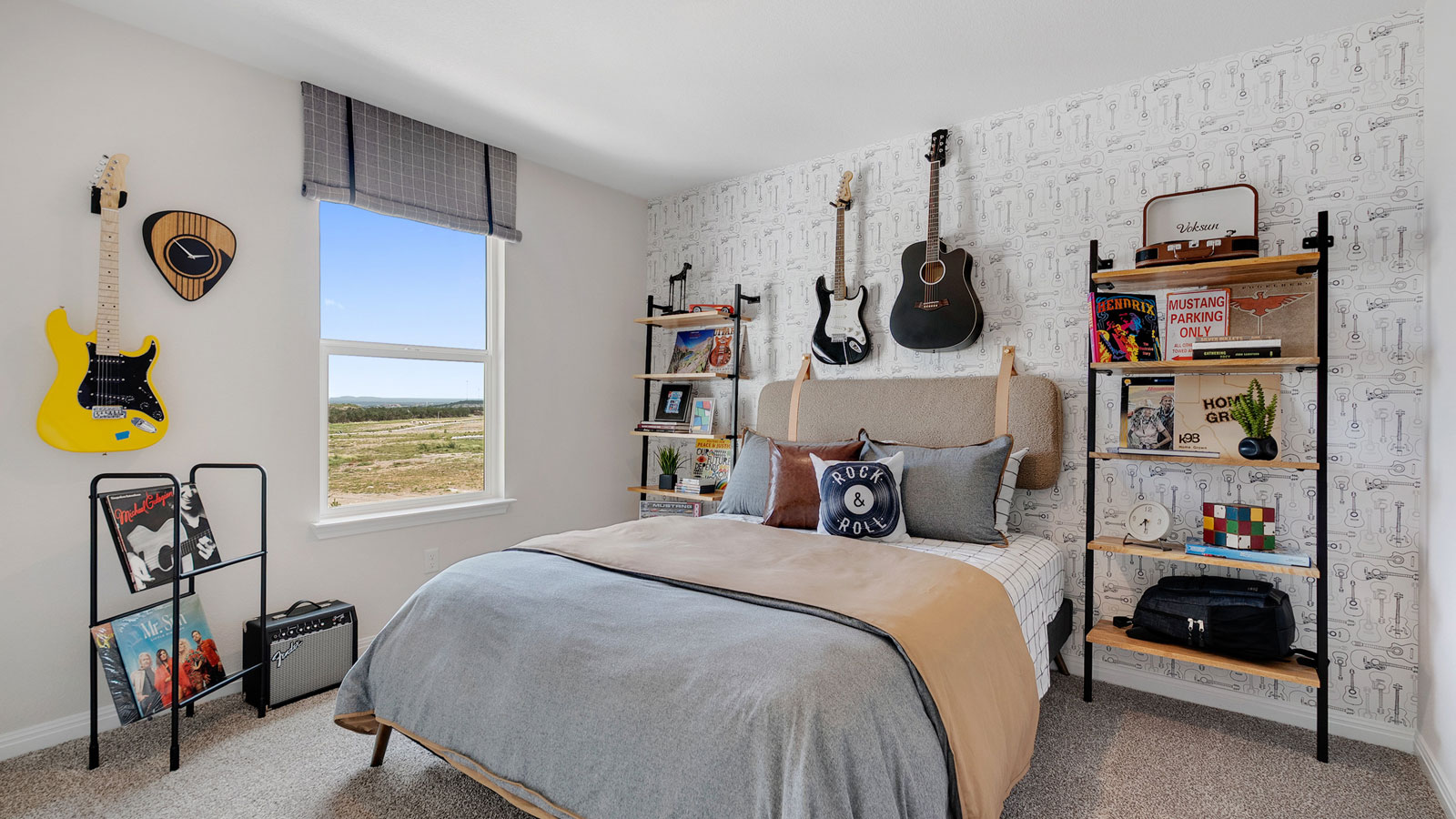 Carpeted bedroom with simple decor and natural lighting.