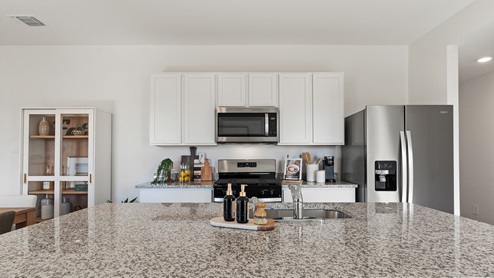 The Caroline floorplan - B Elevation at Watermill in Uhland, TX.