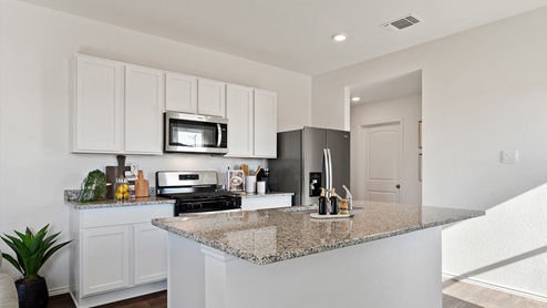 The Caroline floorplan - B Elevation at Watermill in Uhland, TX.