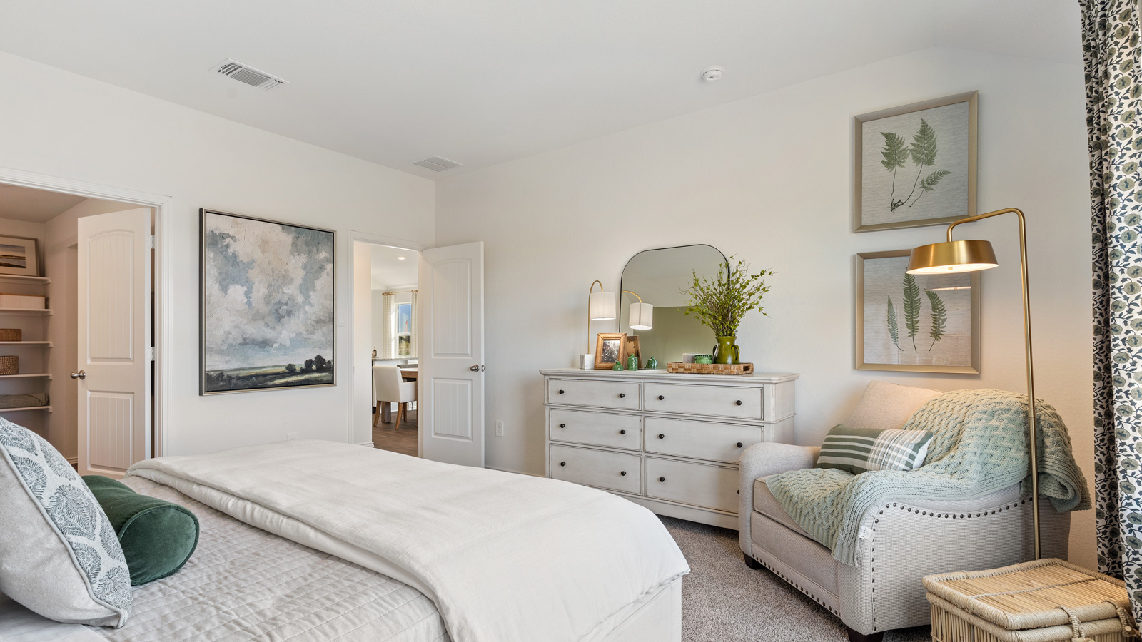 Bedroom 1 with carpeted floors and two large windows.