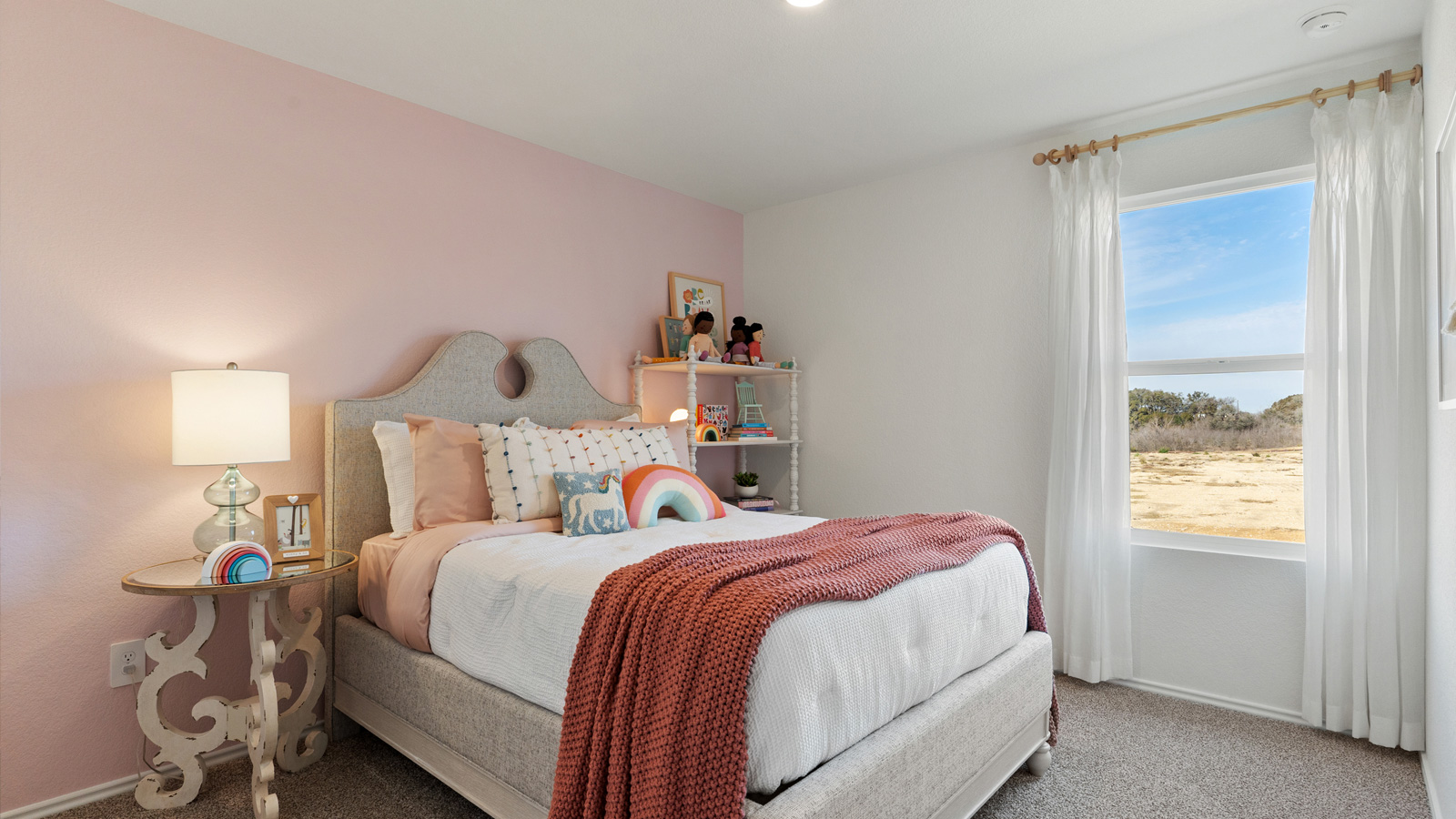 Bedroom 3 with carpeted floors.