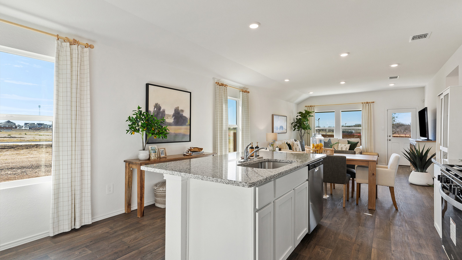 Gourmet kitchen with granite countertops and stainless steel appliances.