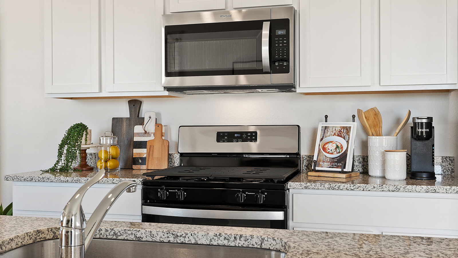 Gourmet kitchen with granite countertops and stainless steel appliances.