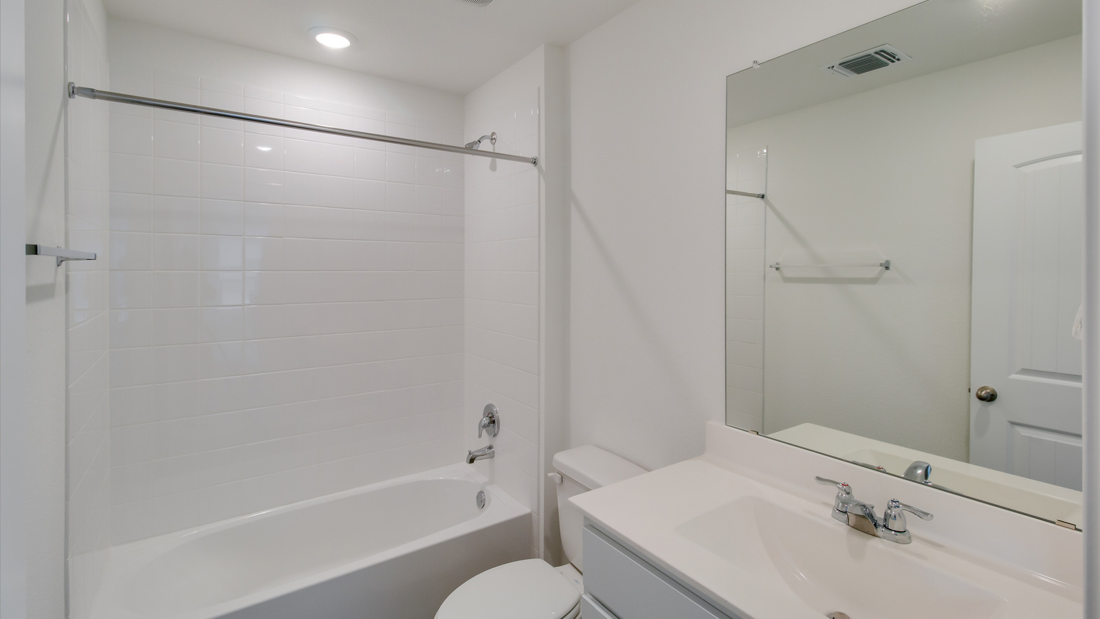 Bathroom 2 with shower and bathtub combo.