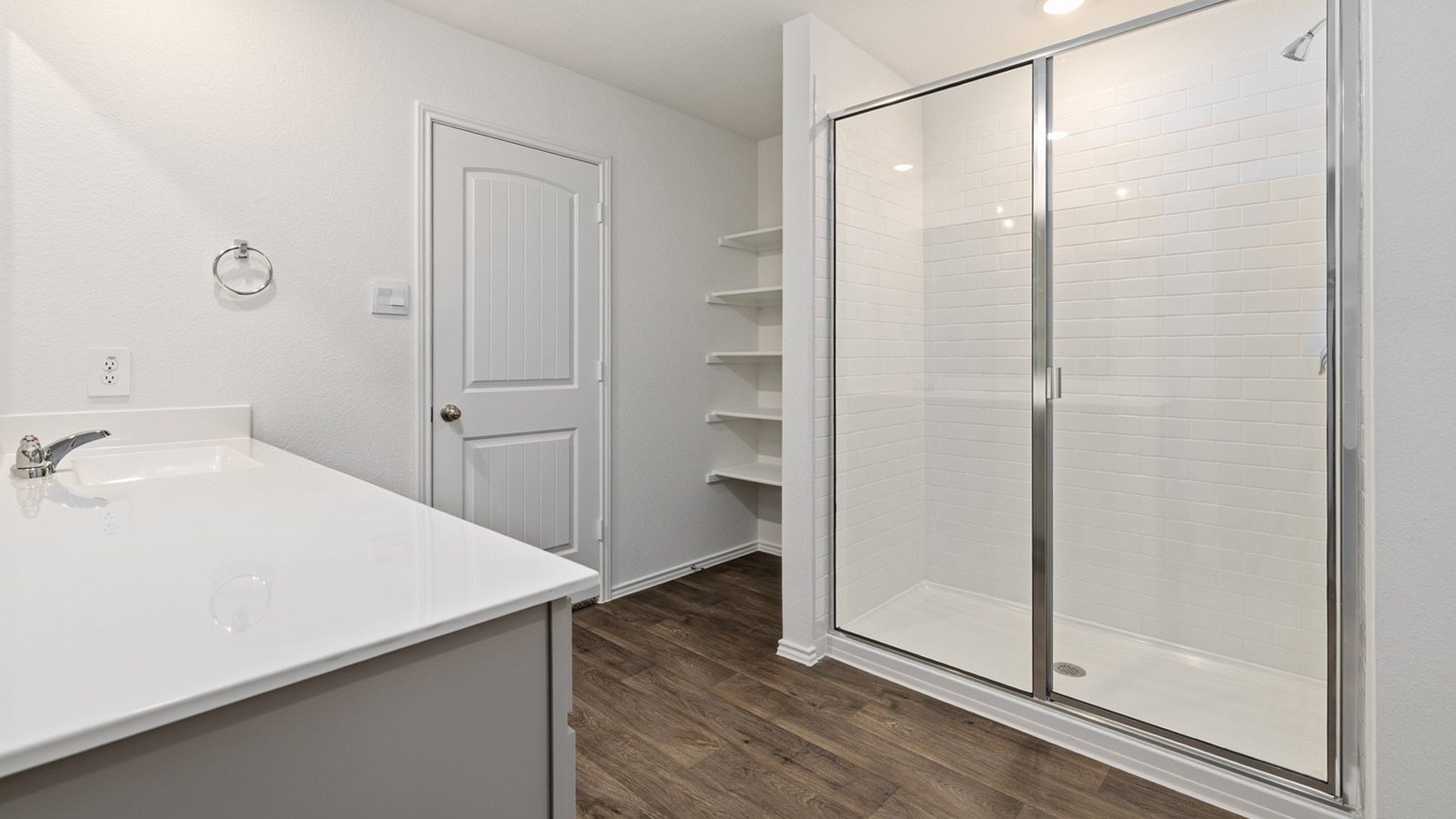 Walk-in shower in primary bathroom.
