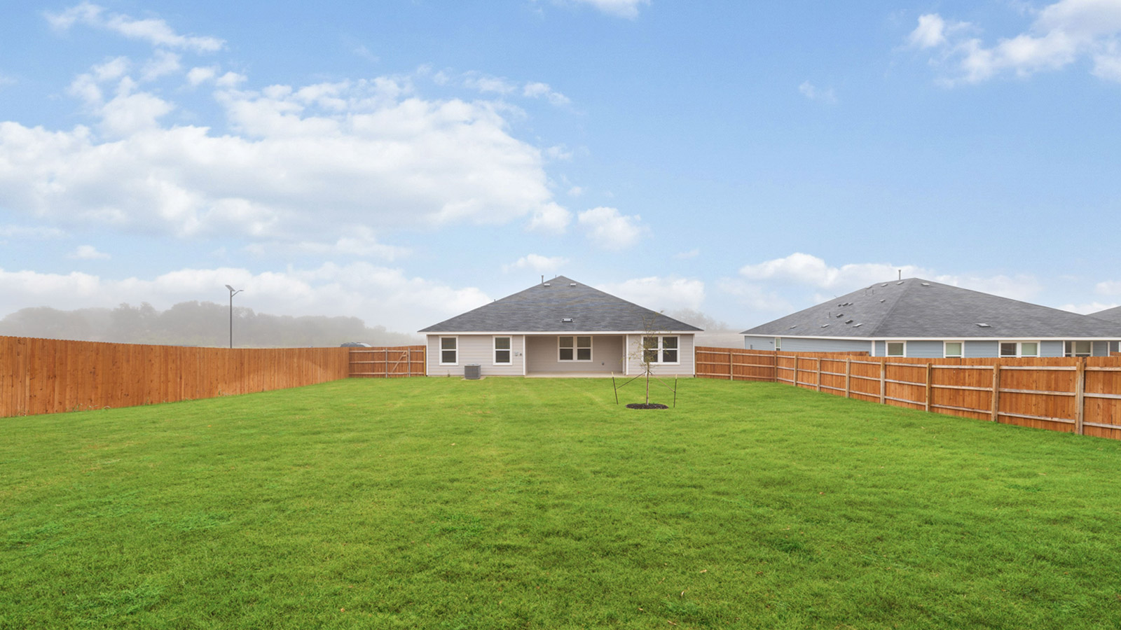Oversized backyard of 663 Ebbsfleet Drive in Uhland, TX.