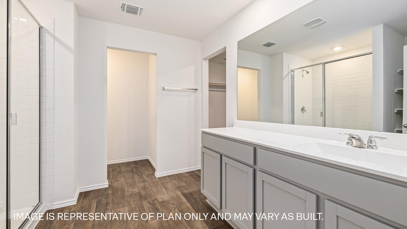 Primary bathroom with walk-in shower.