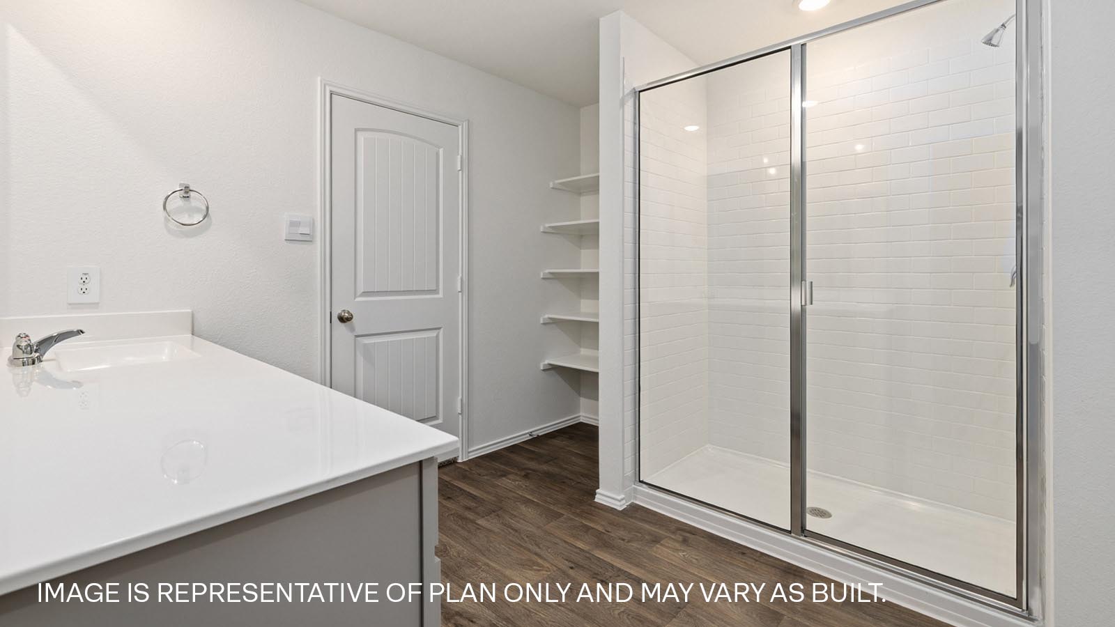 Primary bathroom with walk-in shower.