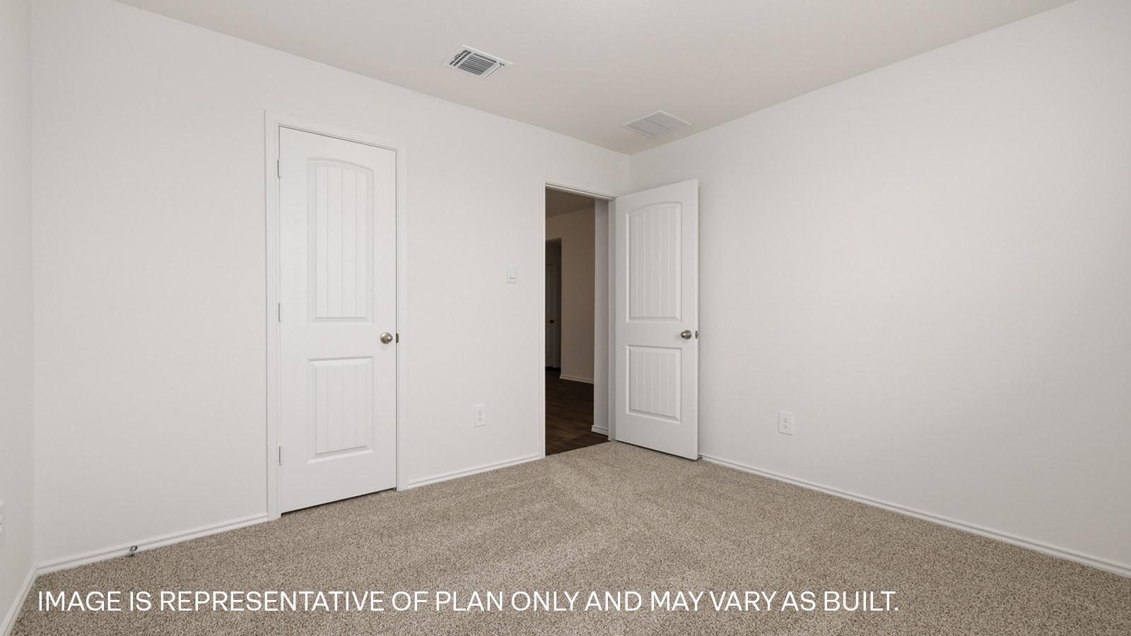 Bedroom 4 with carpeted flooring and window.