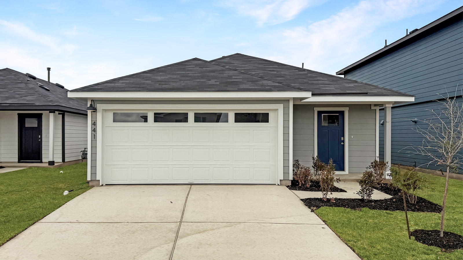 Exterior shot of 441 Sandringham Loop at Watermill in Uhland, TX.