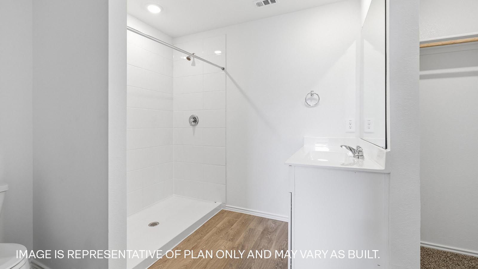 Primary bathroom with walk-in shower.