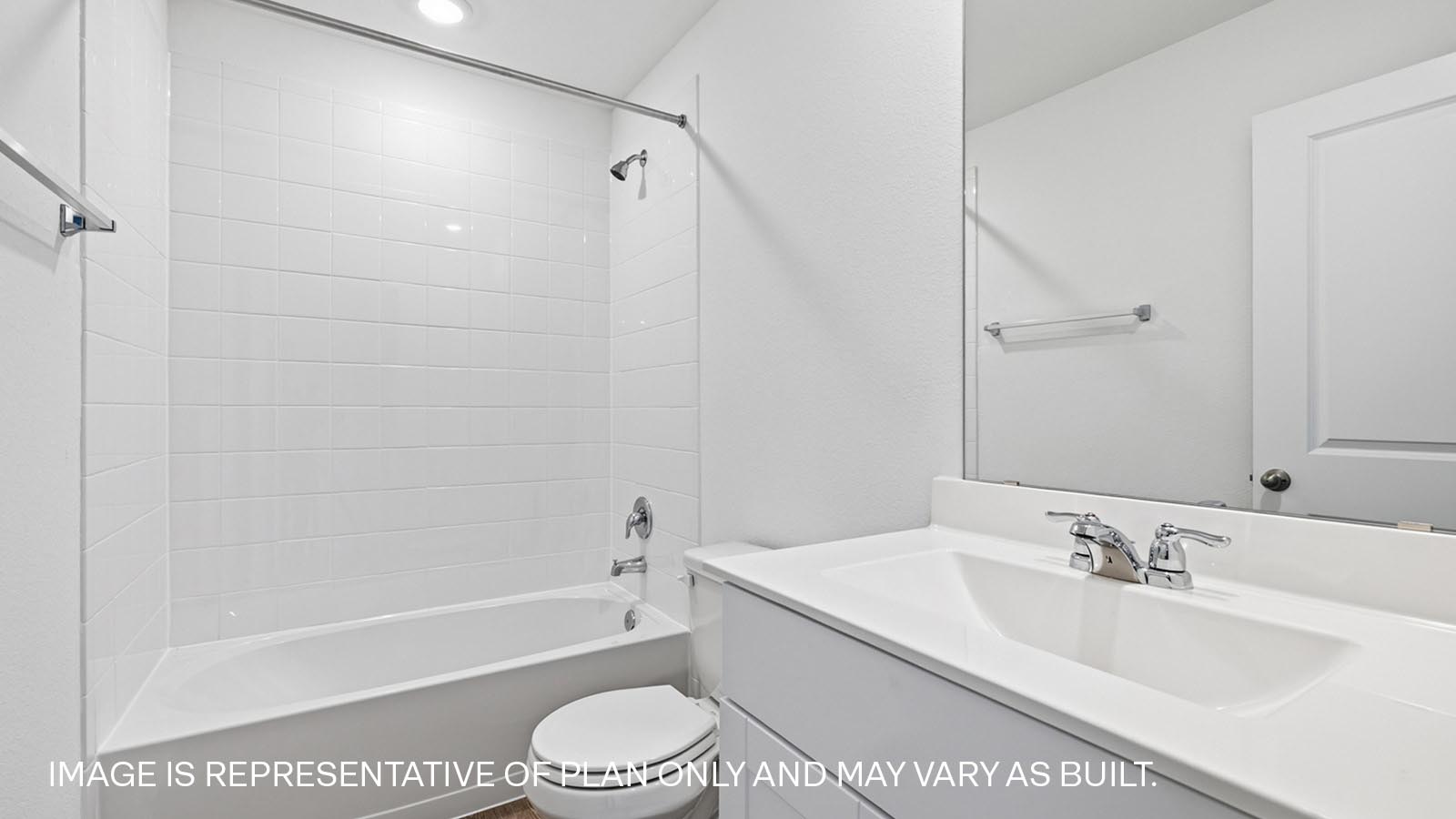 Secondary bathroom with tab and raised shower head.