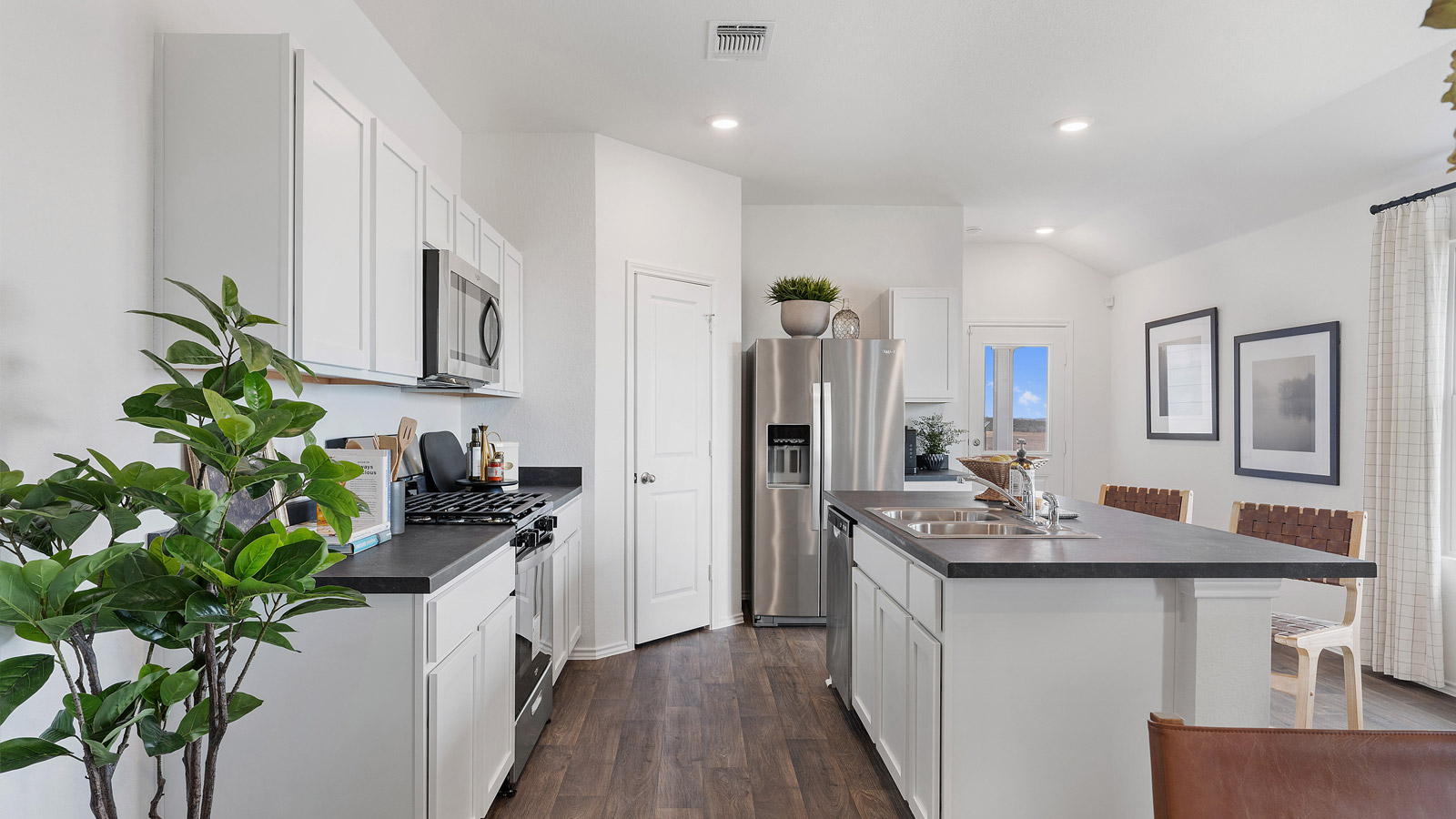 Gourmet kitchen with stainless steel appliances.