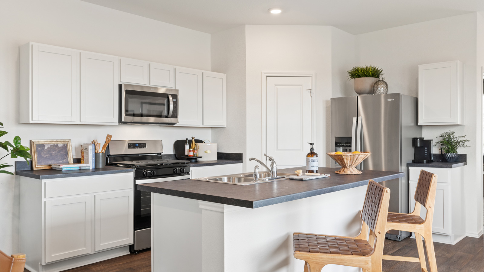 Gourmet kitchen with stainless steel appliances.