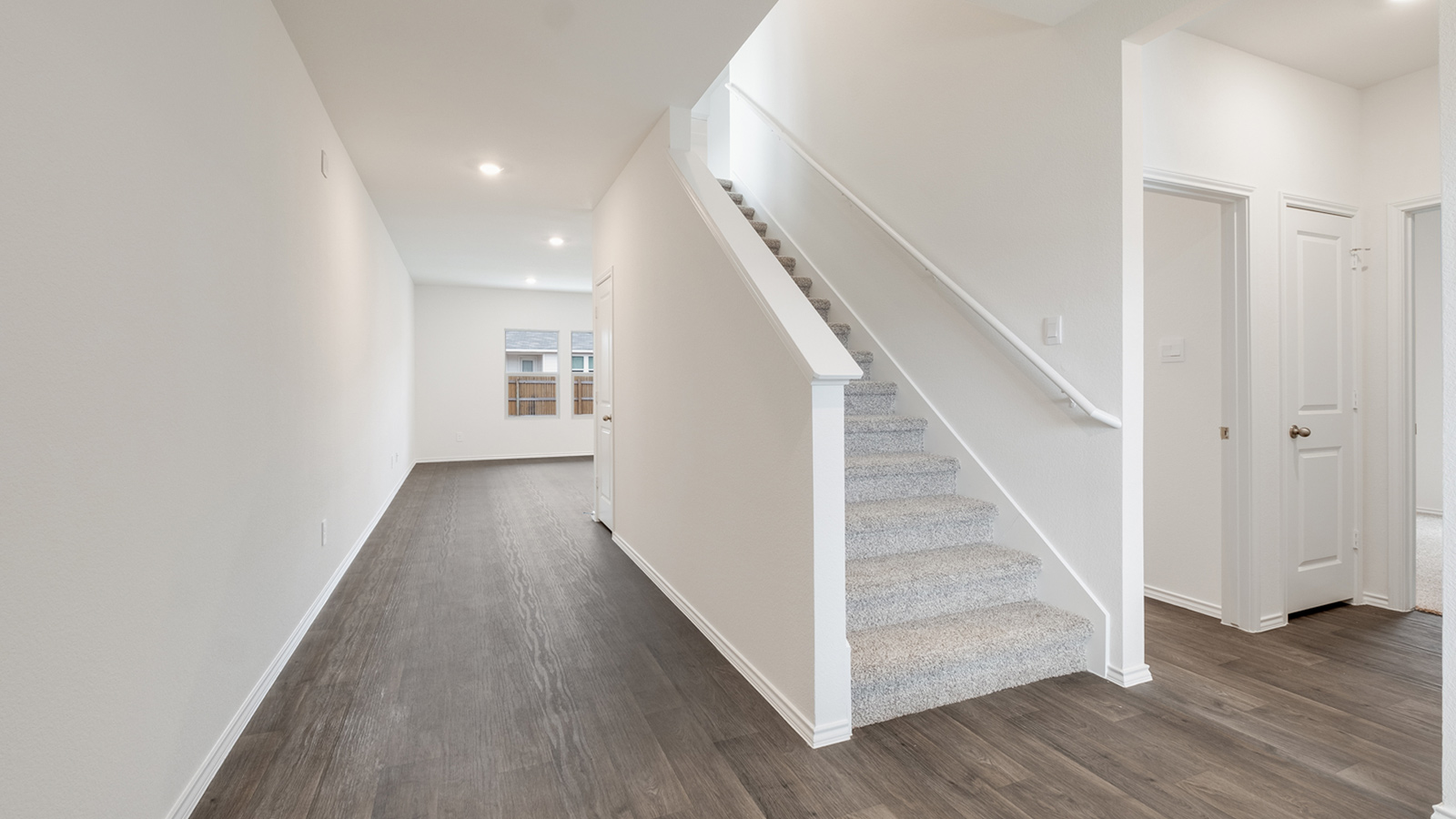 Entryway with view of staircase.