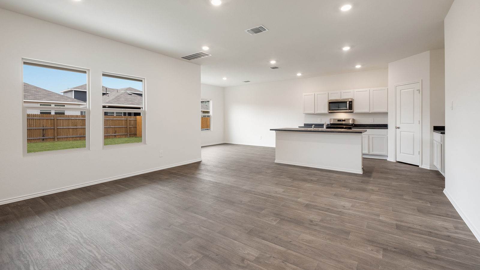 Open concept living area and kitchen.