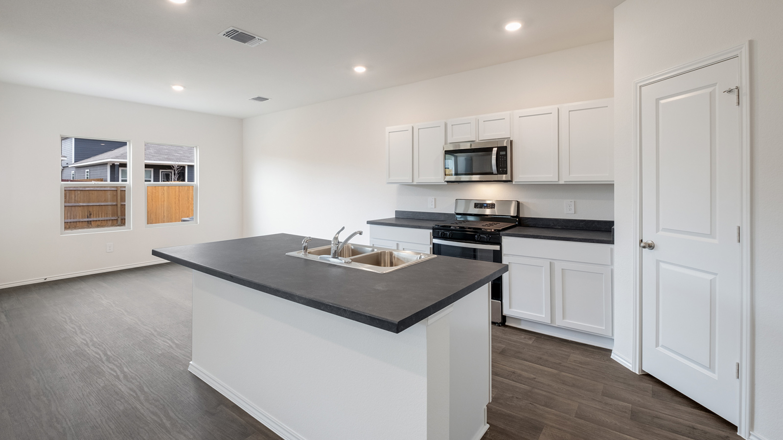 Gourmet kitchen with stainless steel appliances.