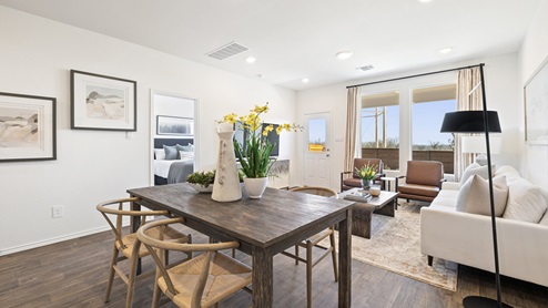 Interior view of the living room, dining room, and kitchen