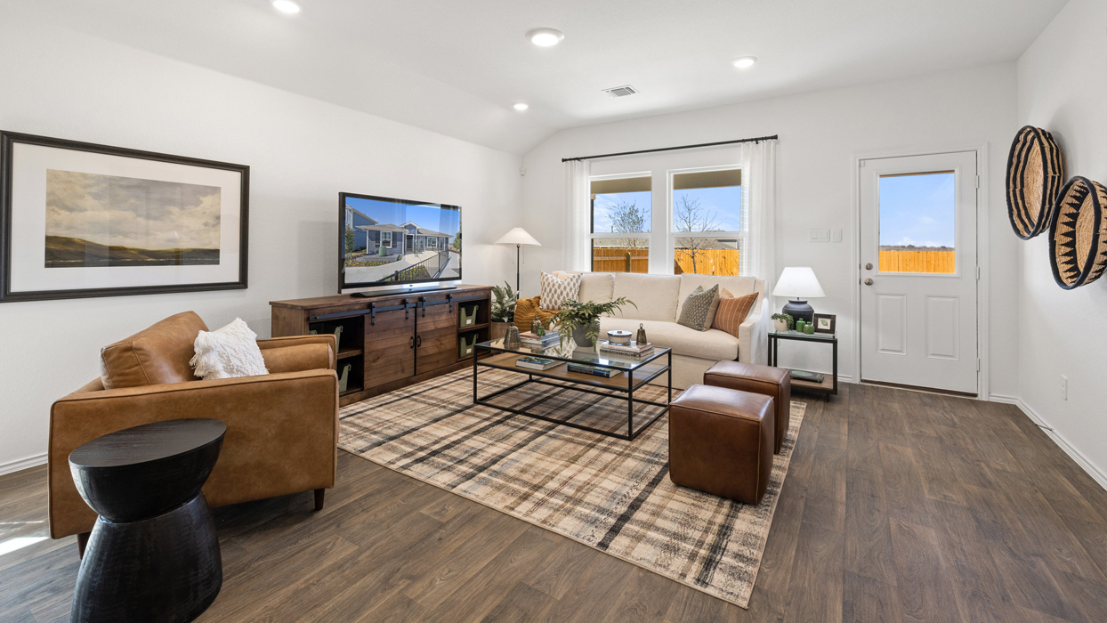 Interior living area with large window and back door