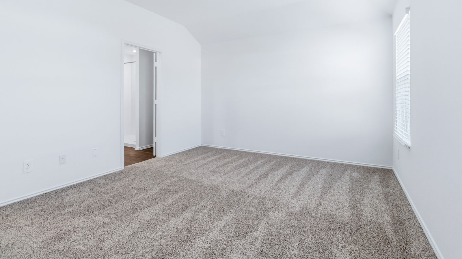 D.R. Horton’s new home features a stylish, calm oasis in the primary bedroom with a walk-in closet, spa-inspired ensuite